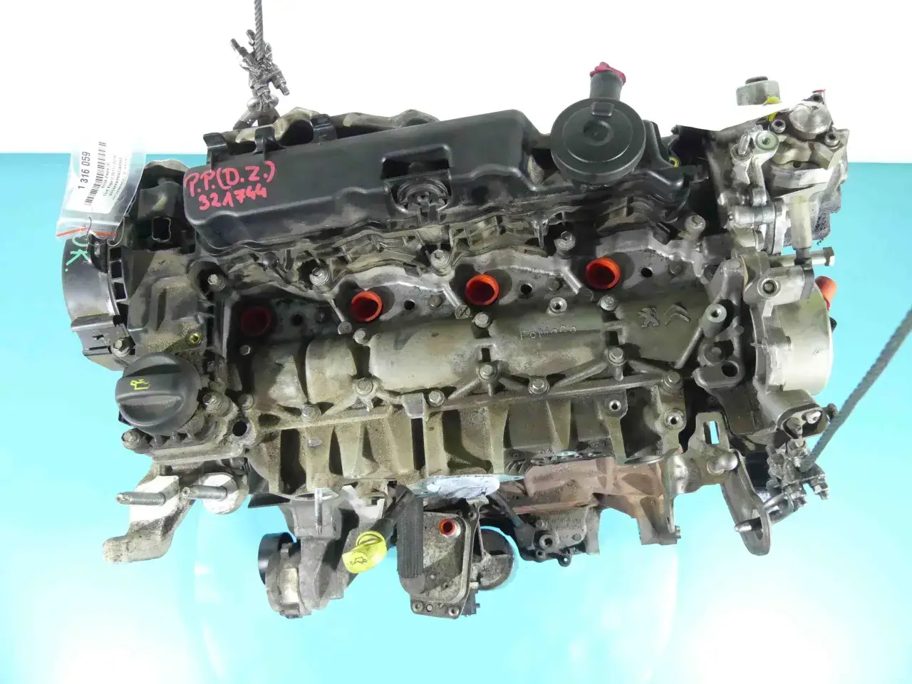 Silnik Ford Kuga 2.0 TDCI, gotowy do montażu. Widoczne oznaczenia P.P.(D.Z.) 321744.