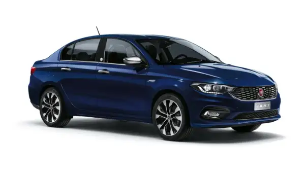Elegancki, granatowy fiat tipo sedan z chromowanymi detalami i felgami. Idealny do miasta i na dalsze trasy.